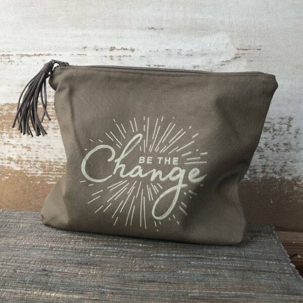 Pouch with be the change inscription
